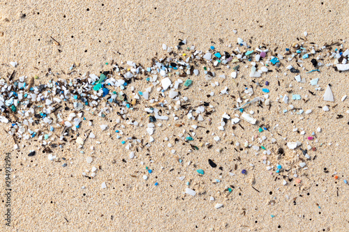 Fototapeta Naklejka Na Ścianę i Meble -  Micro Plastics Washing Ashore On The Beach In Hawaii, USA