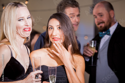 Women Being Watched by Men at Party and Cringing