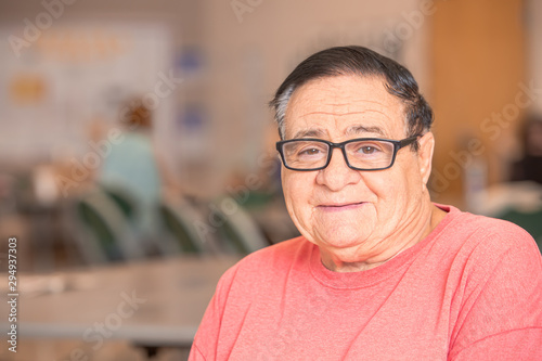 Smiling Hispanic Man in a Senior Center