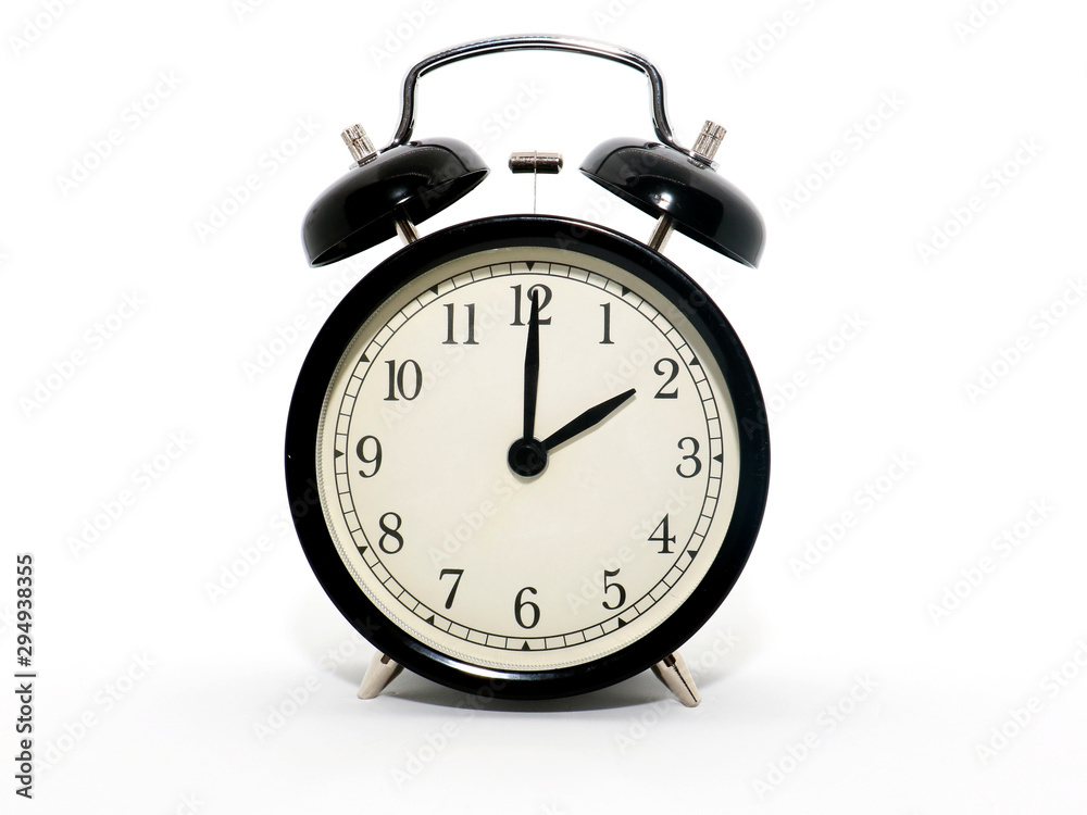 Old-style alarm clock, black and white, it's two o'clock. Old-style alarm clock, black and white, it's two o'clock.