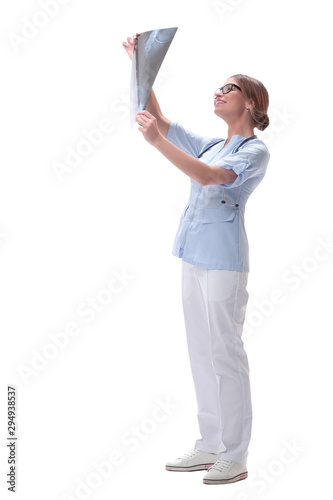 woman doctor looking at x-ray. isolated on white