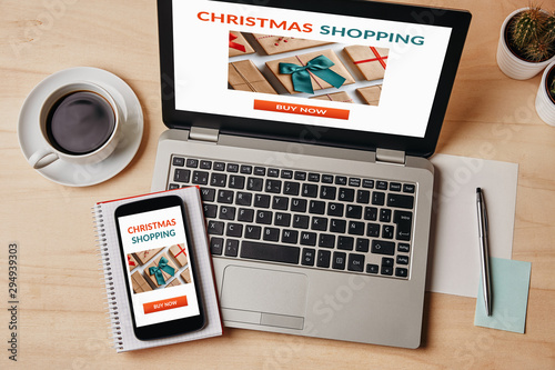 Christmas shopping concept on laptop and smartphone screen