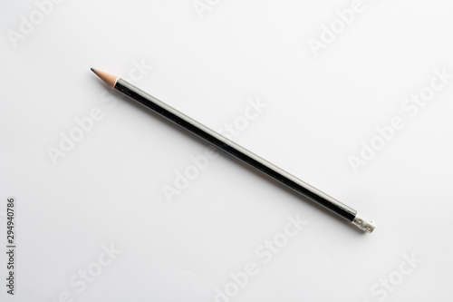 Wooden pencil black color on white background