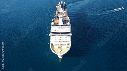 Aerial top view photo of huge cruise liner with pools and outdoor facilities cruising the Atlantic blue ocean © aerial-drone