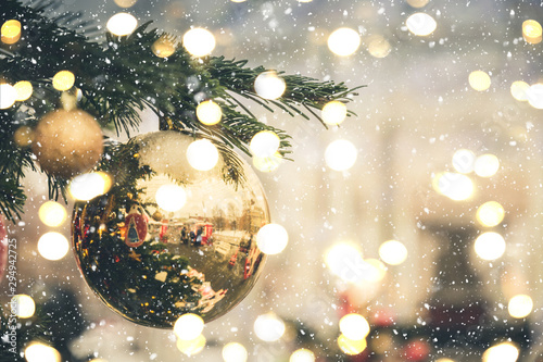 Christmas tree with golden balls. Xmas card and pattern. Close up. Winter. Outdoor.