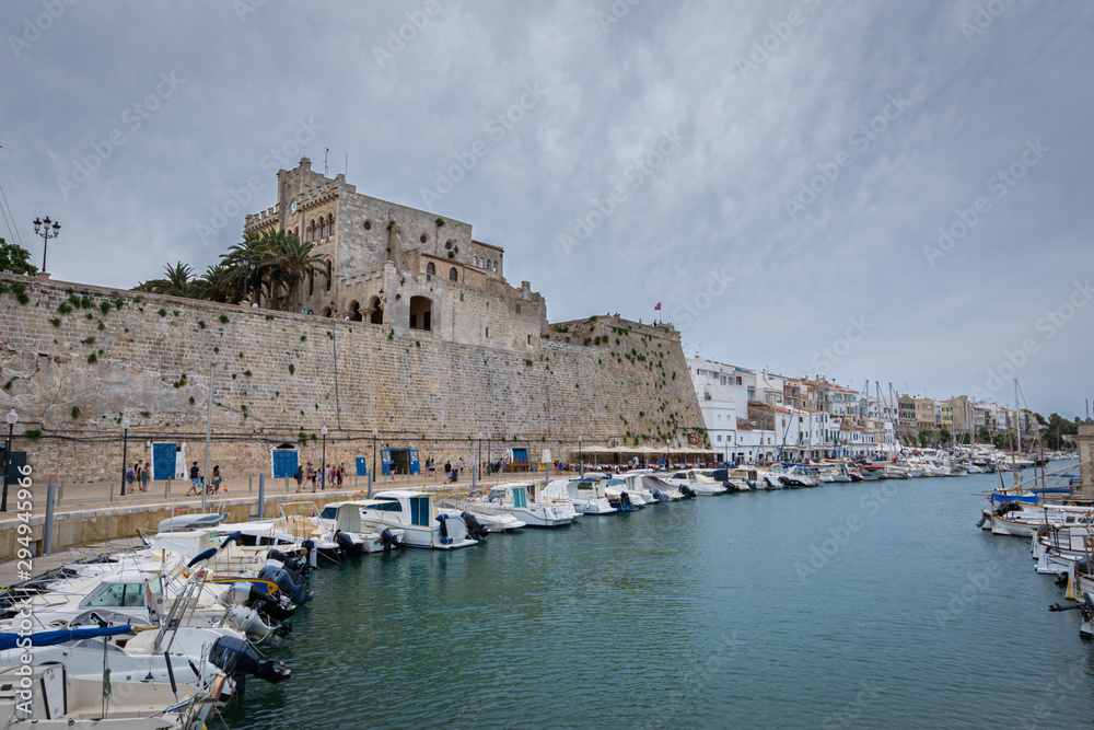 View on old town Ciutadella sea port on a cloudy day, Menorca island, Balears, Spain.