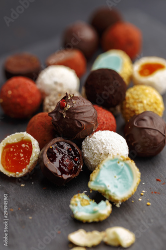 handmade scattered whole and broken chocolate candies
