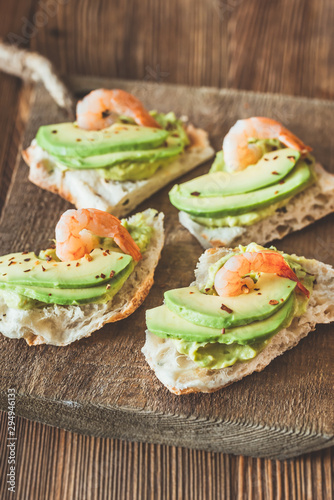 Sandwiches with avocado and shrimps