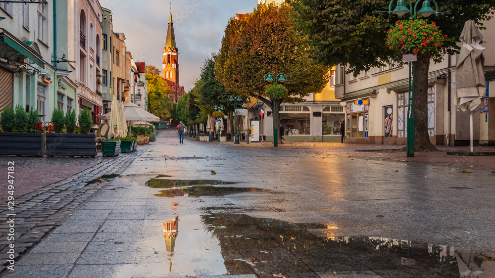 Beautiful architecture of Sopot, church and Monte Cassino street at morning, Poland. October. - obrazy, fototapety, plakaty 