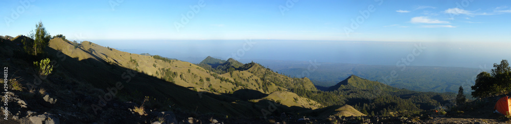 Obraz premium Panoramic view of volcano Gunung Rinjani. Mount Rinjani National Park, Lombok island, Indonesia.