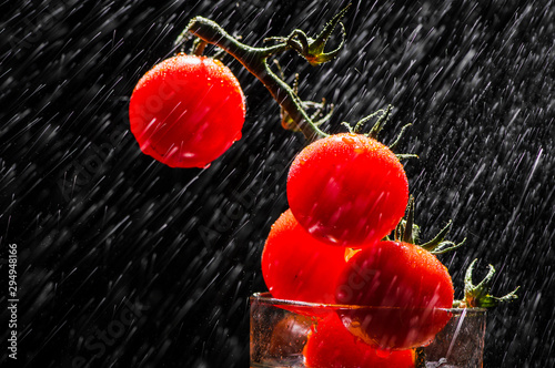 Vitamins are food for vegetarians. Cherry tomatoes in water.