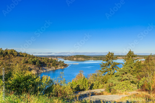 Landscape at sunrise seen from Rastplats Skåpesund on Skåpesund, municipality of Orust V towards the Svanvik nature reserve in Västra Götaland County in Sweden.