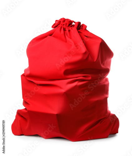 Santa Claus red bag full of presents isolated on white