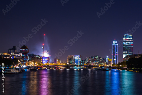 London Cityscape panorama at night, seen from Tower Bridge