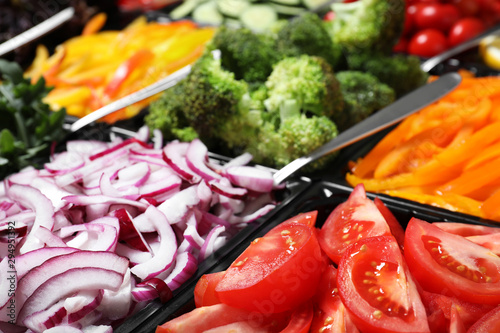 Cuadro en lienzo Salad bar with different fresh ingredients as background, closeup