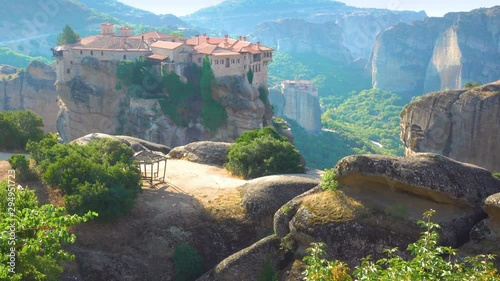 The Holy Monastery of Varlaam on the top of the cliff in Meteora in the morning, Greece -  4k Greek landscape
