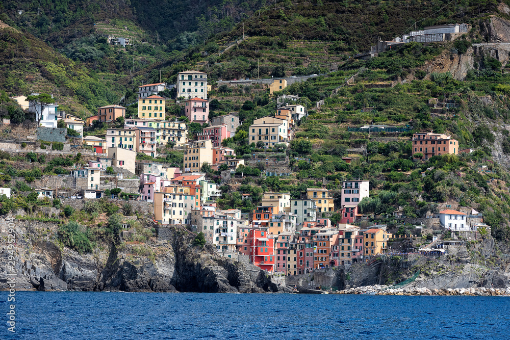 View on small city Riomaggiore from ship.  Liguria, Cinque Terre. Italy