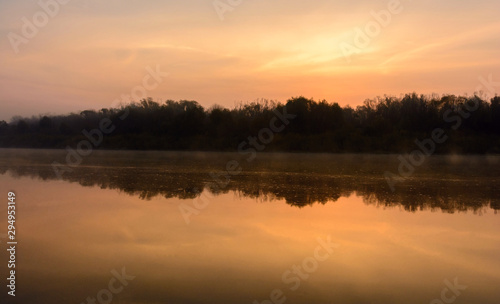 Morning fog on the river. Autumn © TATIANA