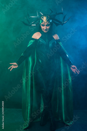 beautiful woman in halloween cosplay costume.  goddess of death 