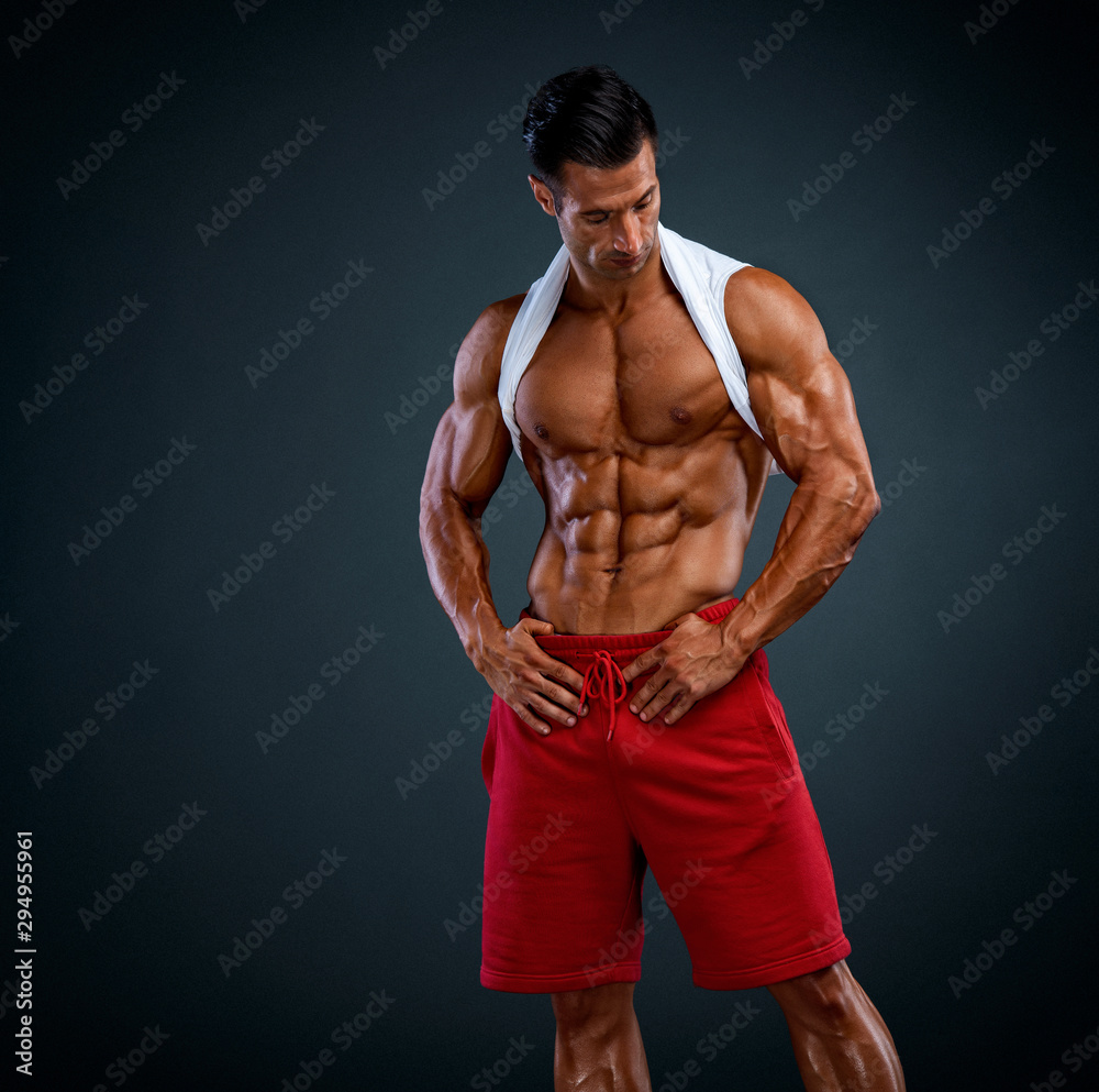 Handsome Muscular Men Posing and Flexing Muscles Handsome Muscular Men Posing and Flexing Muscles