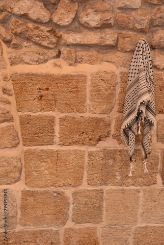 Arab keffiyeh - kafiya on old wall