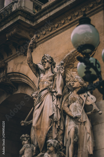 Sculpture near Opera National de Paris (Garnier Palace,1875).Paris Opera - famous neo-baroque building, UNESCO World Heritage Site.Paris,France.Architectural details:Dance Facade sculpture by Carpeaux photo