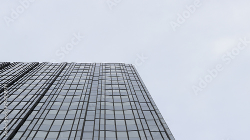 Facade of a glass building going to the sky