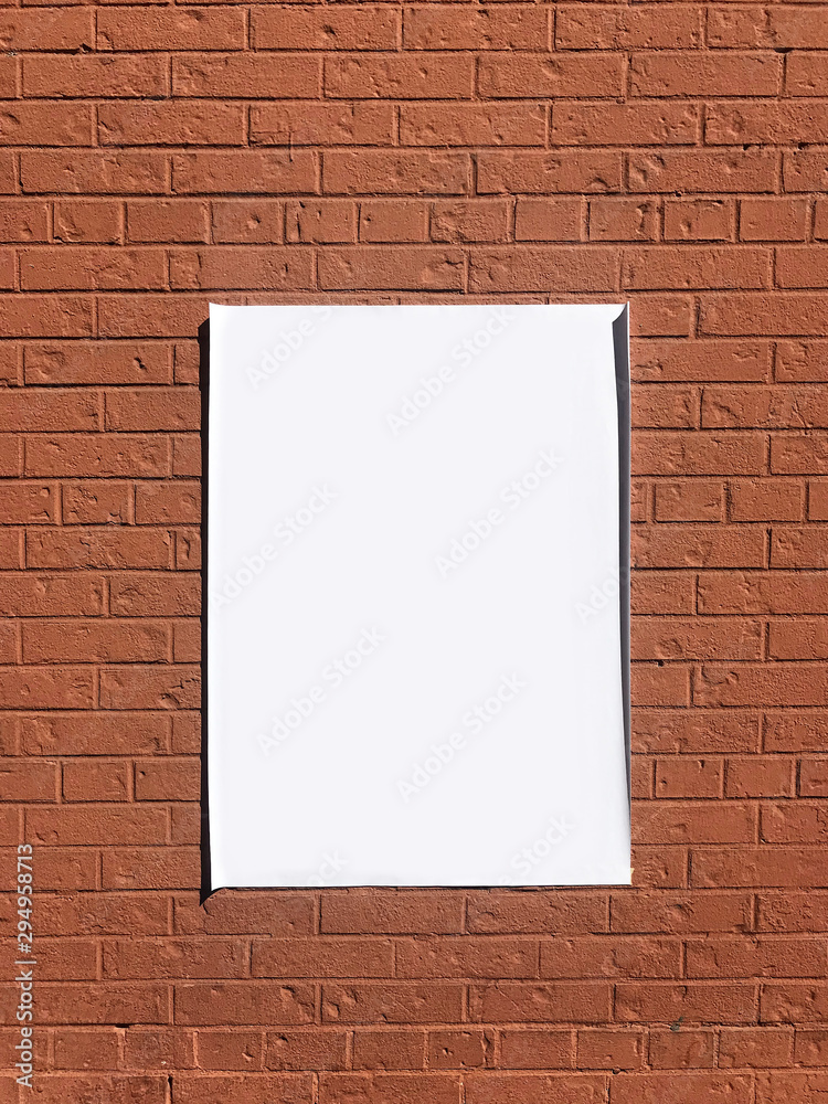 empty poster on brick wall empty poster on brick wall