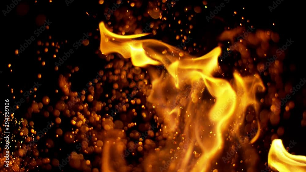 Fire flames and sparks in super slow motion isolated on black, shooting with high speed cinema camera at 4K