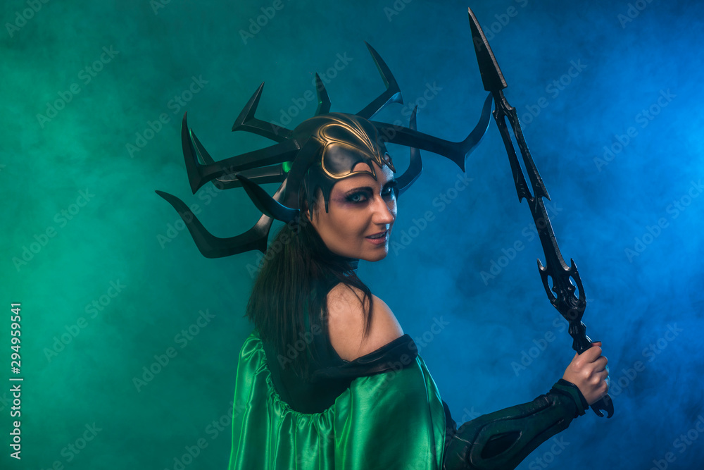 beautiful woman in halloween cosplay costume.  goddess of death 