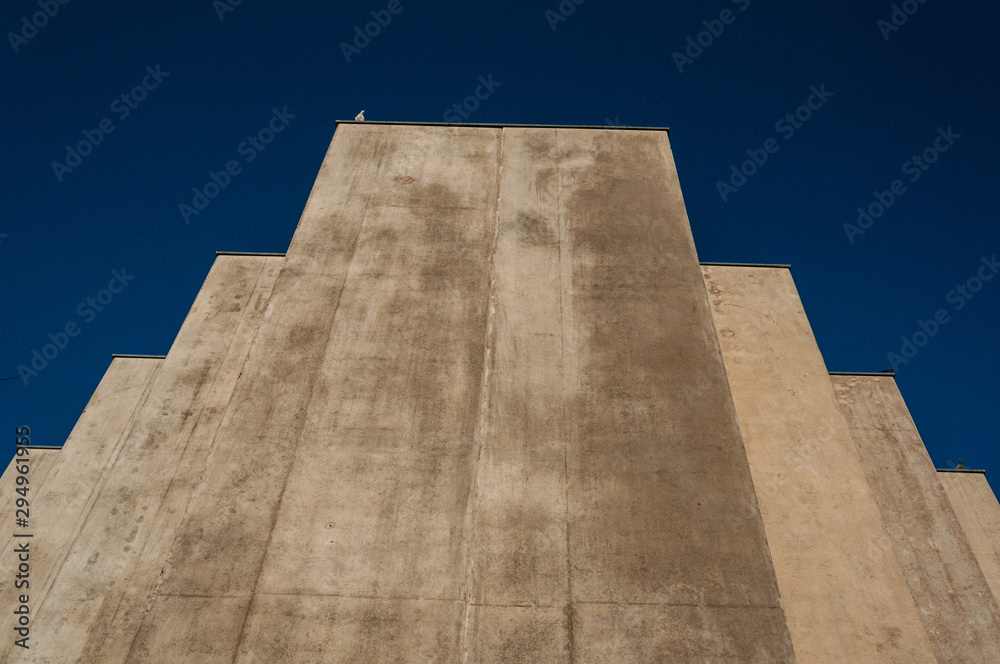 Concrete building with blue sky on backgroung