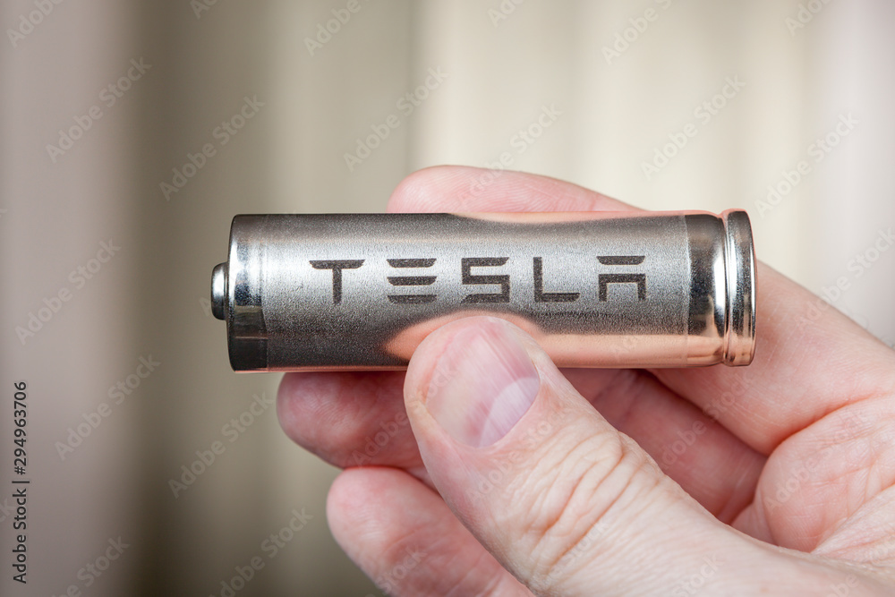 Tesla 2170 Battery lithium ion Cells pack, in human hand. Stock Photo |  Adobe Stock
