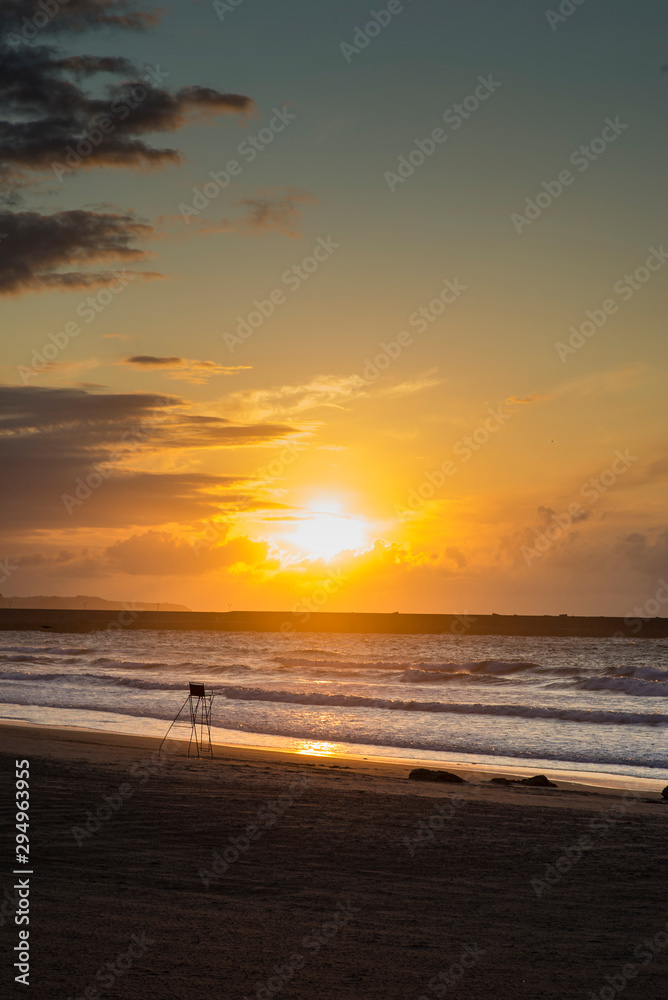 Sunset on Asturias beach. Clouds over the Cantabrian Sea Sunset on Asturias beach. Clouds over the Cantabrian Sea