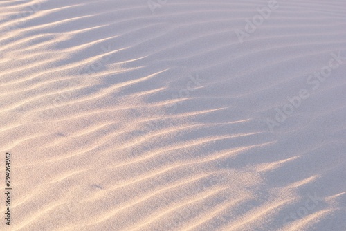 Sand dunes and ripples in the desert on a clear  sunny day