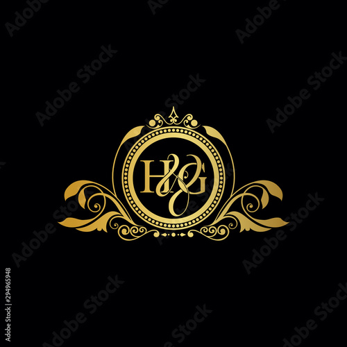 Initial letter HG logo luxury vector mark, gold color elegant classical symmetric curves decor.