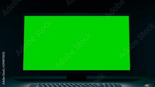 Zoom in on a pc with green screen. 3d animation