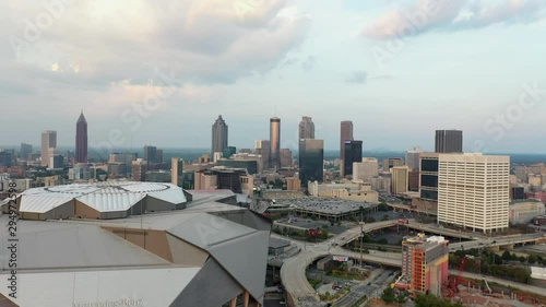 4K Ariel Drone Shot Passing Over Mercedes-Benz Stadium In Atlanta, Georgia USA. Car Stadium, Important Buildings. Tall Skyline Buildinngs In USA. Cloudy Blue Sky, Pretty Buildings