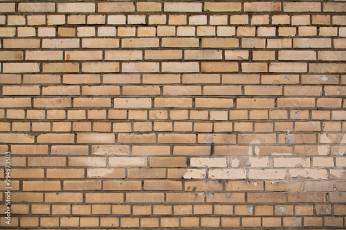 Brick wall with color spots