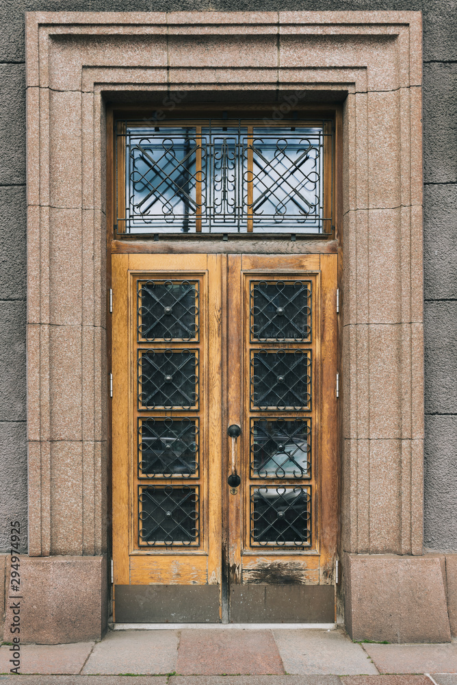 old wooden door in the wall