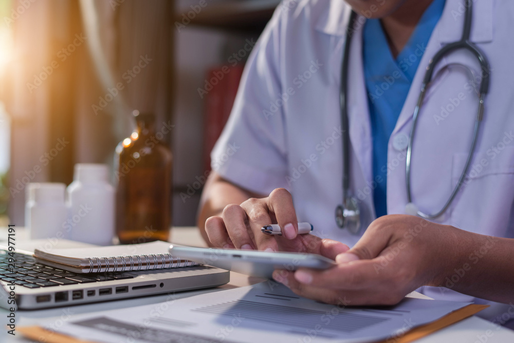 Doctor work on digital tablet healthcare doctor technology tablet using computer. Doctor work on digital tablet healthcare doctor technology tablet using computer.