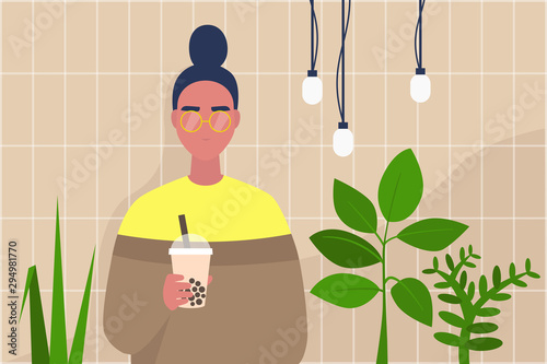 Young female character holding a cup of boba bubble tea to take away in a modern hipster interior with plants and tile pattern