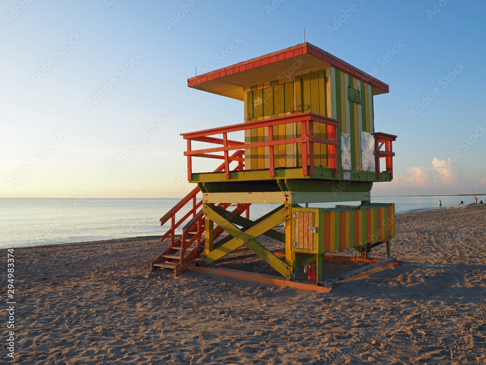 Miami Beach, Florida - )ctober 4, 2014: Colorful lifeguard station on South Beach at sunrise.