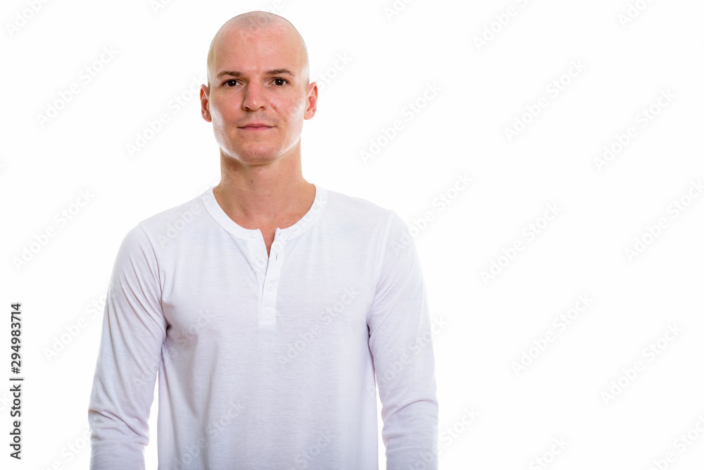 Studio shot of young handsome bald man Studio shot of young handsome bald man