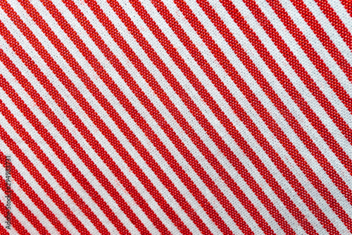 Red and white striped fabric texture for background