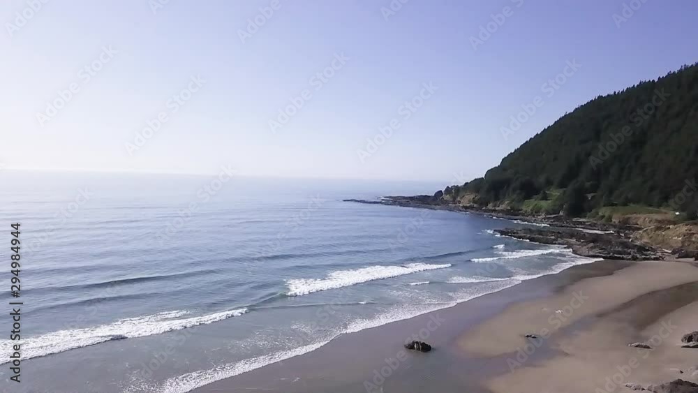 Beautiful Sunny summer day in the oregon Coast with Clear skies stunning rocks nature green mountains Beautiful Sunny summer day in the oregon Coast with Clear skies stunning rocks nature green mountains