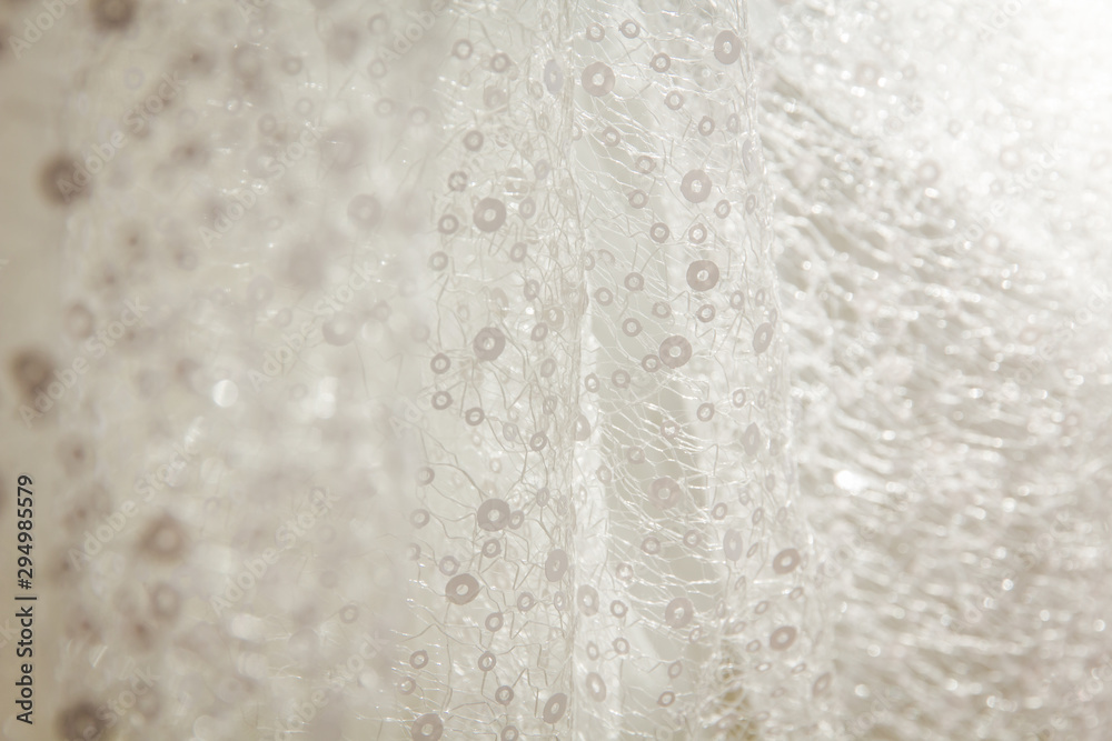 Naklejka premium Details of the bride dress fabric and beautiful embroidery wedding concept used as a background for illustrations