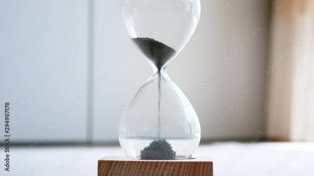 a sandglass made of iron powder and magnet.