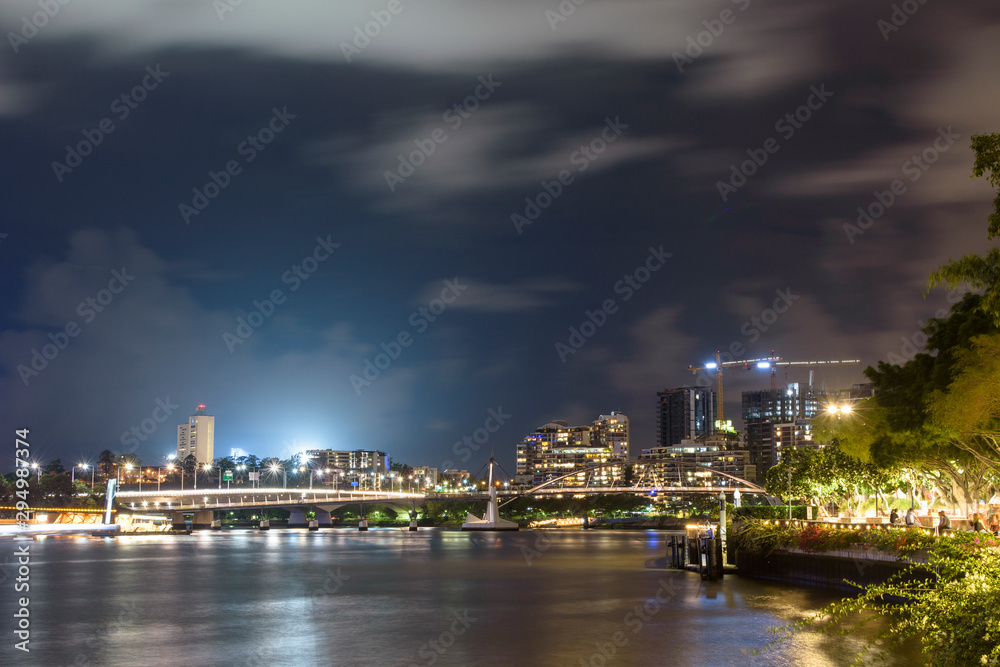 Brisbane, Australia - 4 march 2017: Brisbane city at night with long exposure, light and  buildings at background
