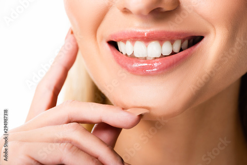 cropped view of smiling woman with white teeth isolated on white