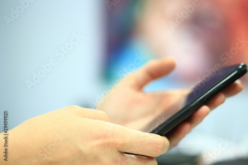 Businesswoman Using Smartphone in office